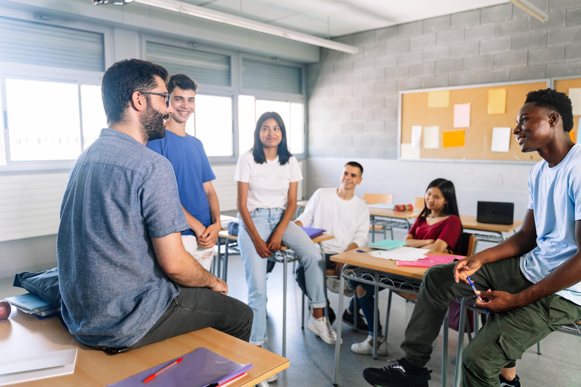 Group of students gathered together in the classroom